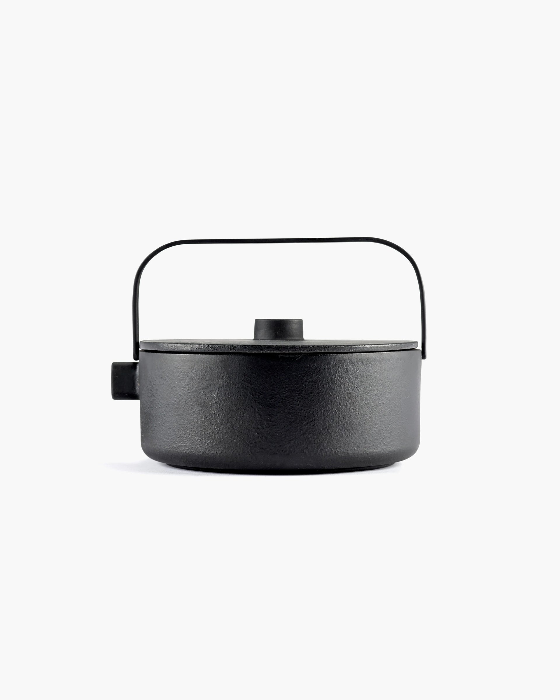 Tea pot cast iron black Collage